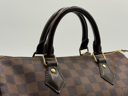 Close-up of the rolled leather handles on the Louis Vuitton Speedy 30