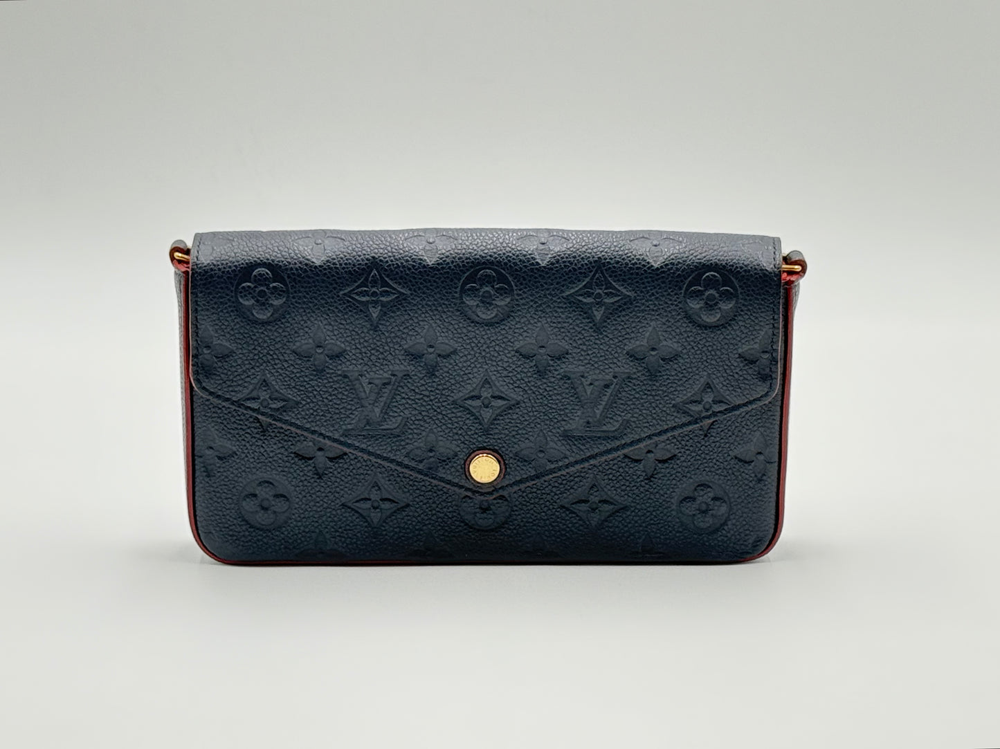 Louis Vuitton Félicie Pochette Monogram Empreinte Marine Rouge — front view with gold snap closure