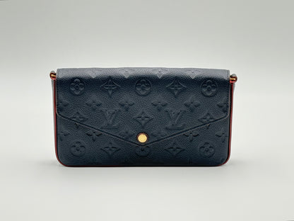 Louis Vuitton Félicie Pochette Monogram Empreinte Marine Rouge — front view with gold snap closure