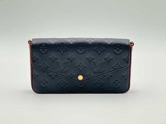 Louis Vuitton Félicie Pochette Monogram Empreinte Marine Rouge — front view with gold snap closure