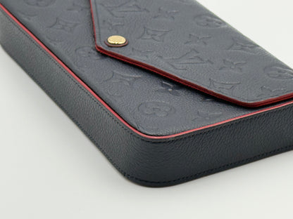 Louis Vuitton Félicie Pochette Empreinte Marine Rouge — flap and gold snap detail