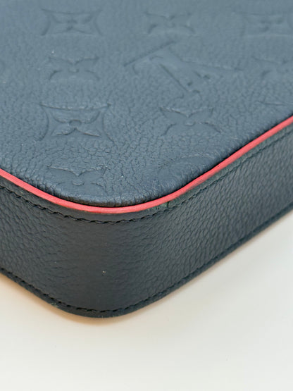 Louis Vuitton Félicie Pochette Empreinte Marine Rouge — corner and red edge paint condition