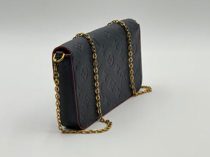 Louis Vuitton Félicie Pochette Empreinte Marine Rouge — side profile with gold-tone chain strap