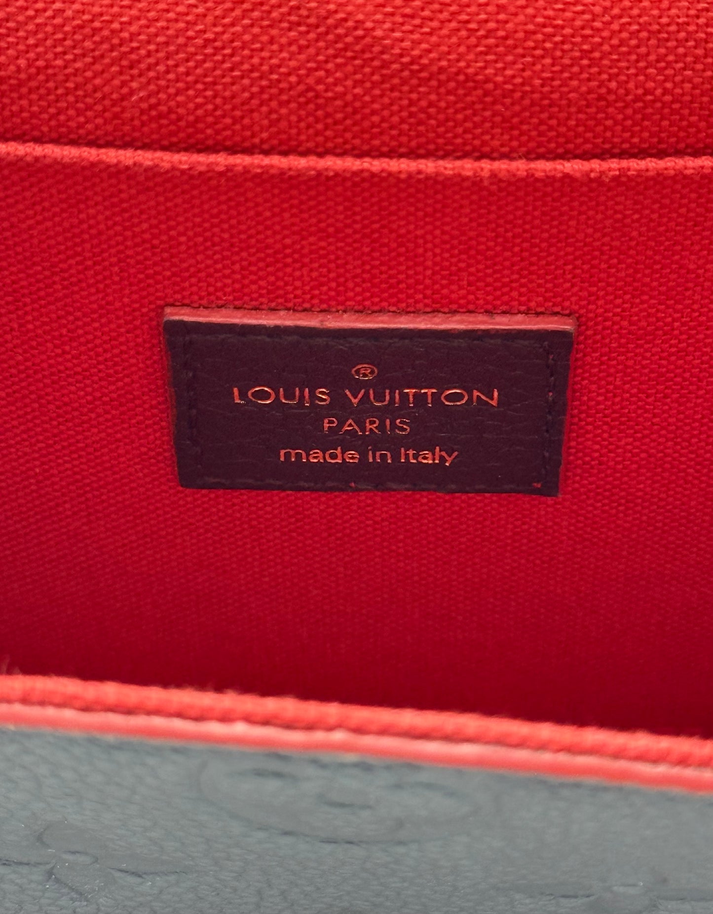 Louis Vuitton Félicie Pochette Empreinte Marine Rouge — red interior lining and Made in Italy heat stamp