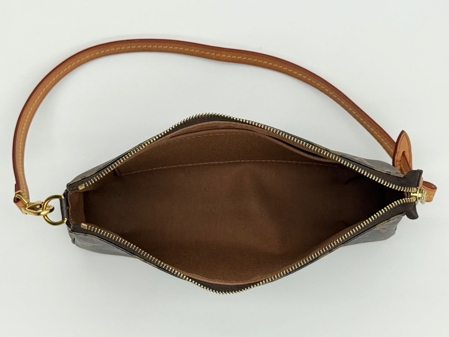 Louis Vuitton Pochette Accessoires Monogram — open interior showing brown textile lining