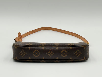 Louis Vuitton Pochette Accessoires Monogram — side profile showing strap attachment