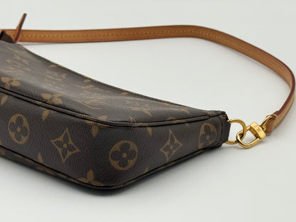 Louis Vuitton Pochette Accessoires Monogram — gold-tone clasp and zip pull detail